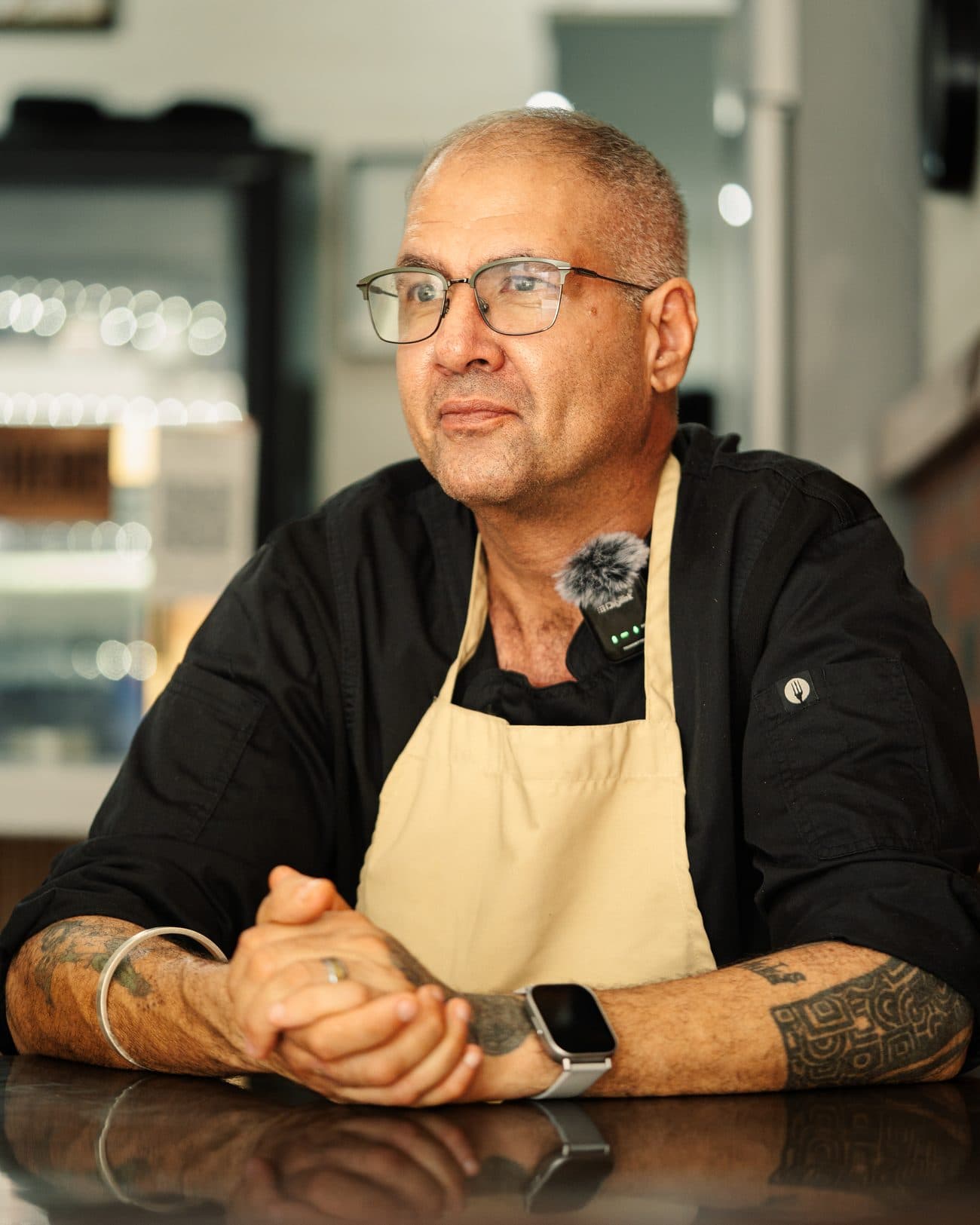 Chef Devinder S. Mahal behind the counter at Dev's American Cafe